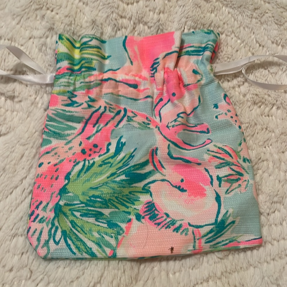 Closing Closet- 5 for $25 on select items.
Lilly Pullitzer bracelet with bag. - Picture 3 of 6